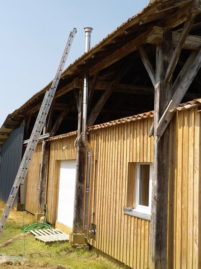 fumisterie en ventouse zone 2 en facade en double peau isolé dans le Gers (32)